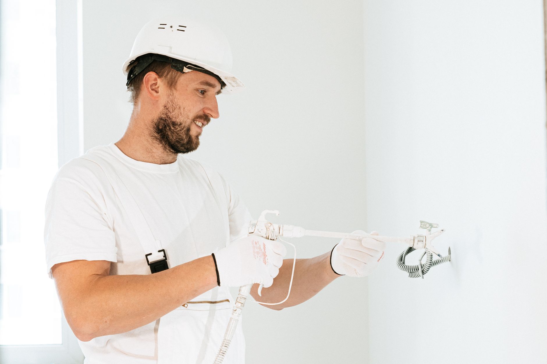 Professional installer preparing wiring for a CCTV installation