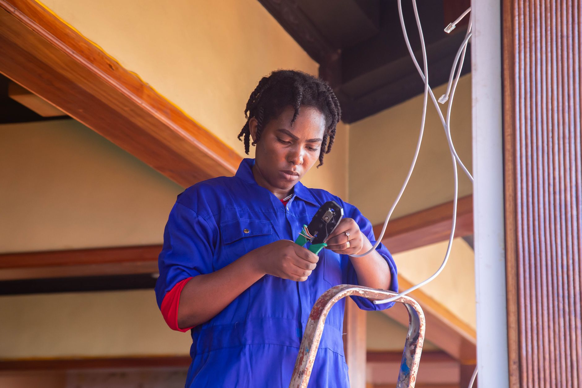 Professional technician preparing CCTV installation wiring